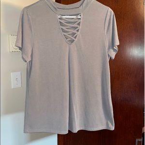 Grey top. Cross tie on top